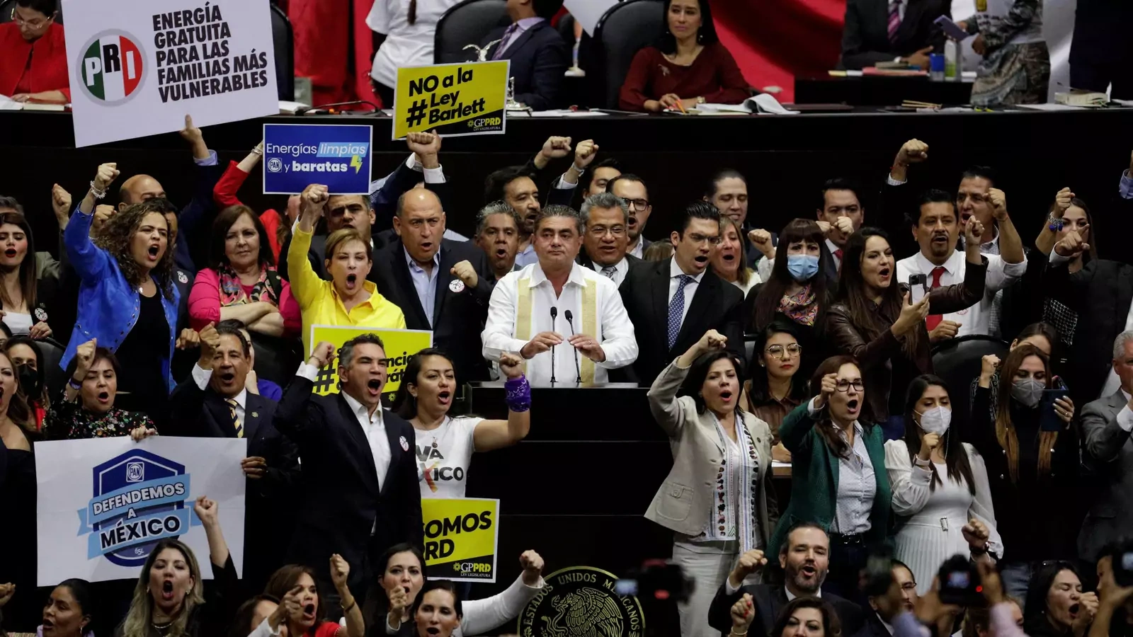 Mexican legislators protest a constitutional reform of the country's energy sector.