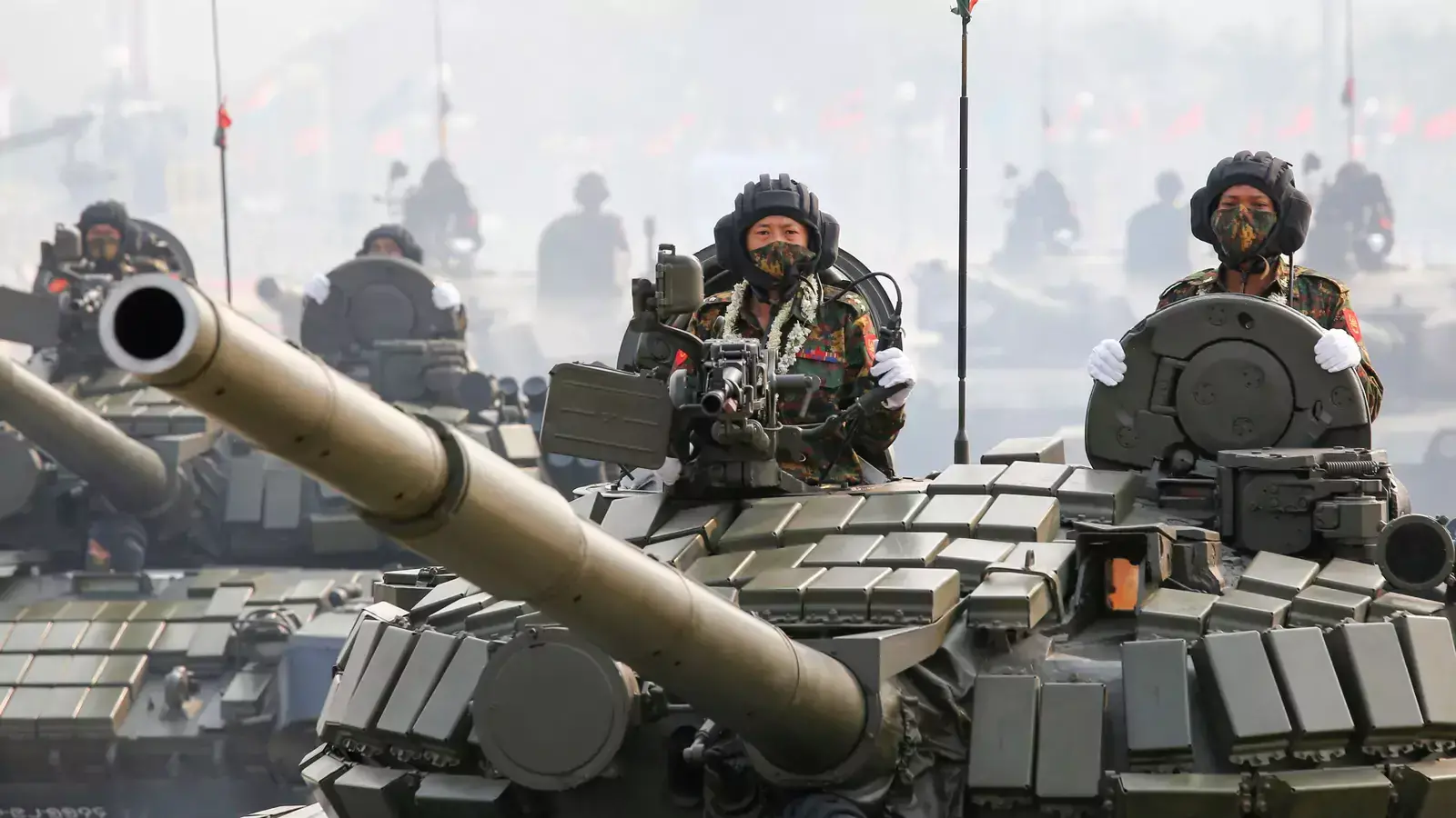 Military personnel in tanks participates in a parade on Armed Forces Day in Naypyitaw, Myanmar, on March 27, 2021.