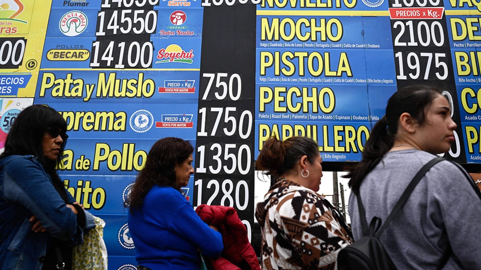 People line up in front of a butcher shop in Buenos Aires, Argentina.