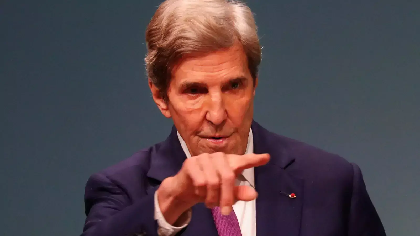 U.S. Climate Envoy John Kerry takes questions during a news conference at COP 28 in Dubai