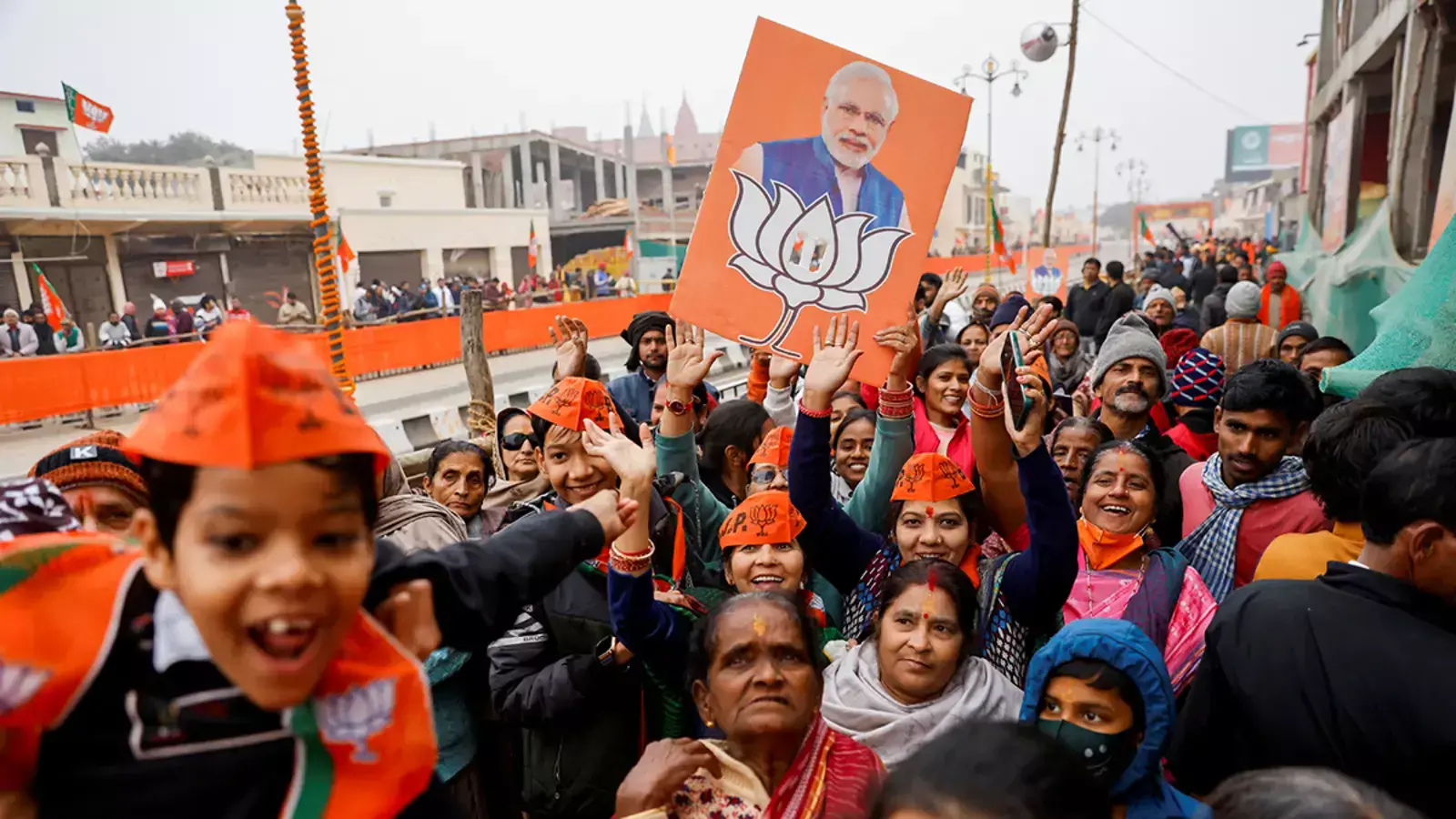 Supporters of Bharatiya Janata Party (BJP) cheer after India’s Prime Minister Narendra Modi’s roadshow in Ayodhya, Uttar Pradesh, India.