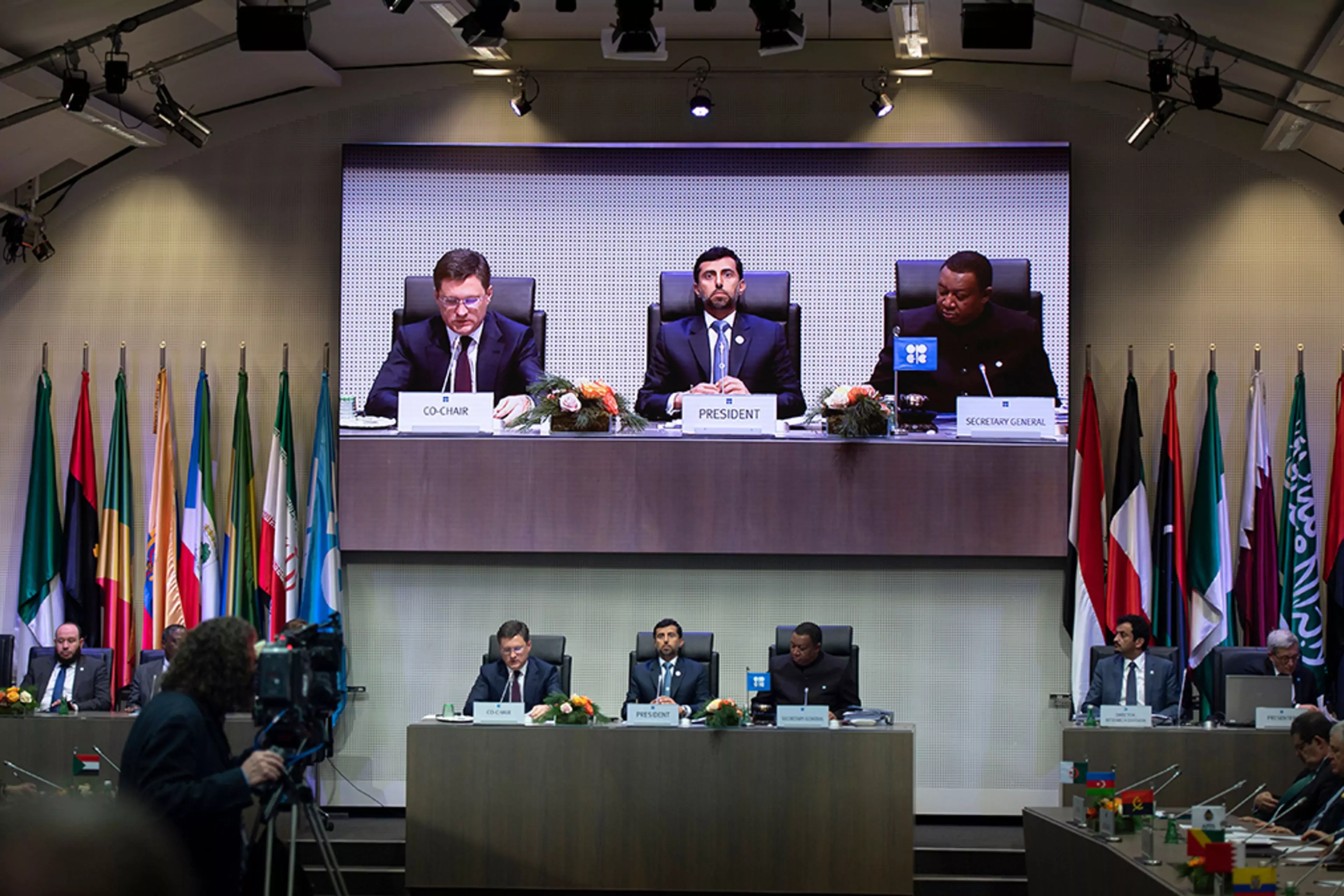 Russian and Emirati energy ministers speak alongside the OPEC secretary-general in Vienna.