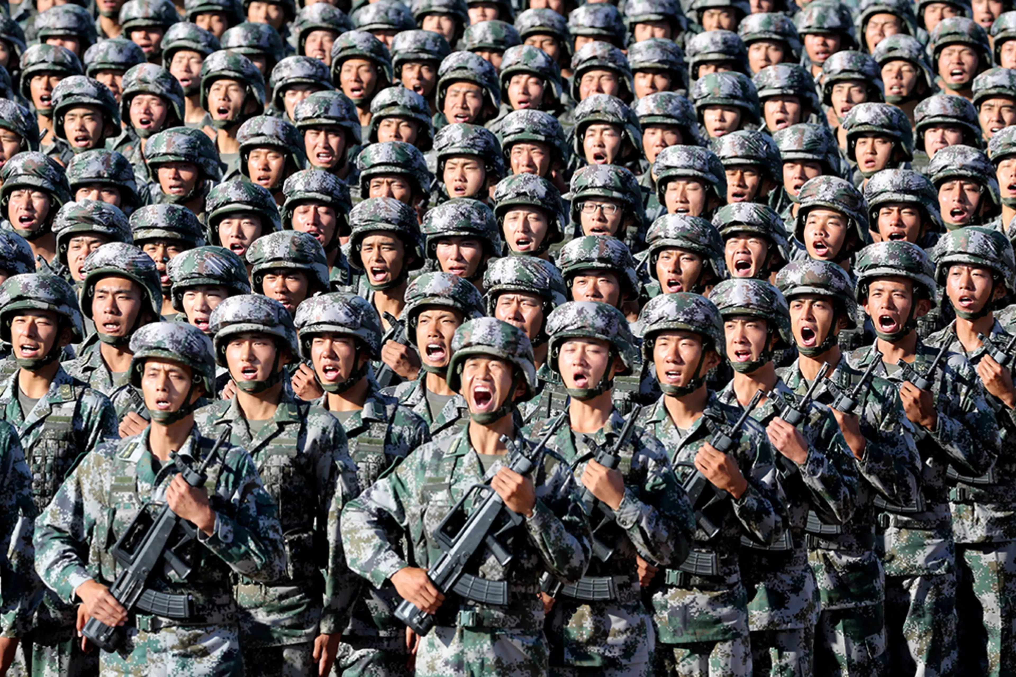 PLA soldiers prepare for a military parade in 2017.