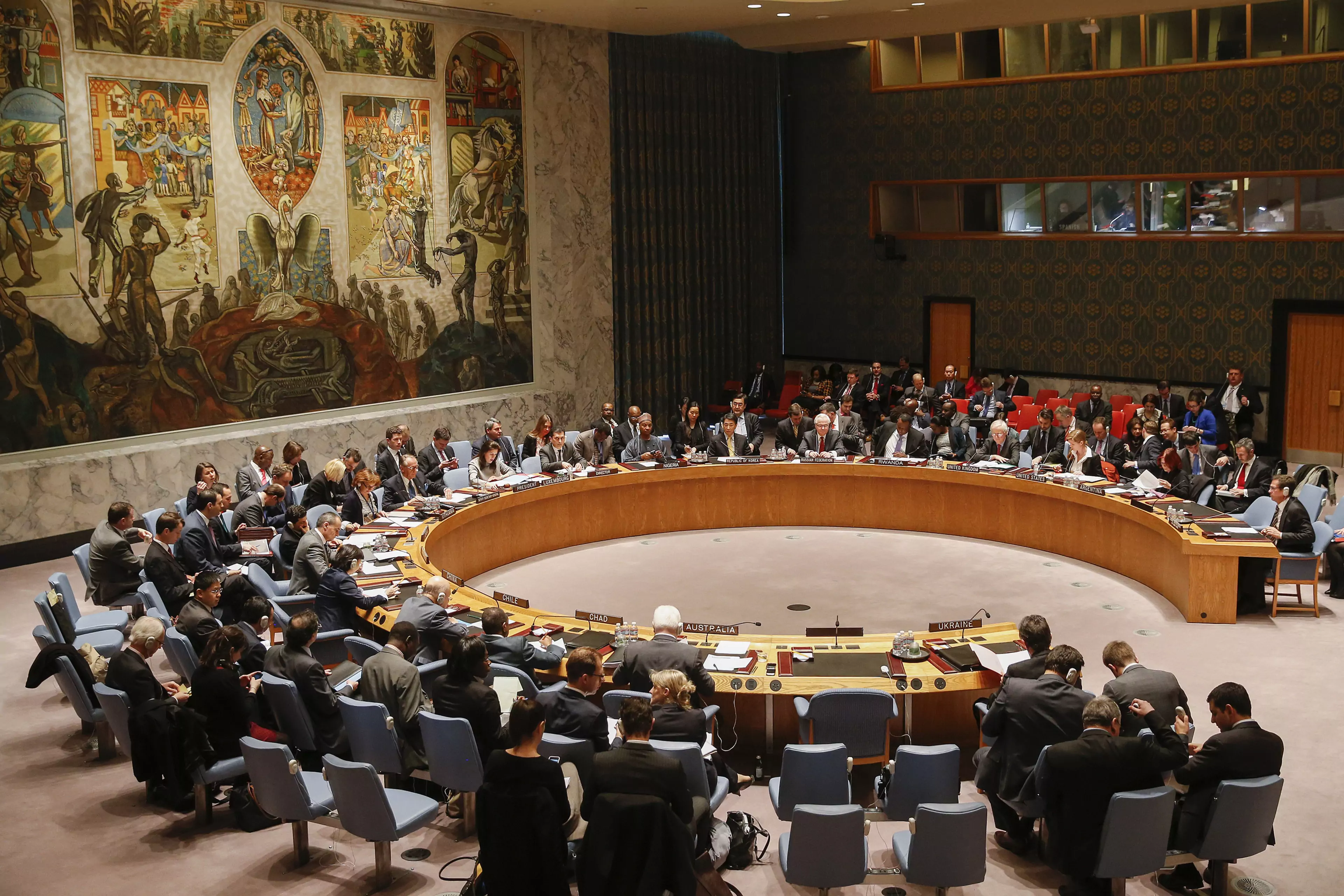 Members of the Security Council sit during a meeting at the UN headquarters in New York.