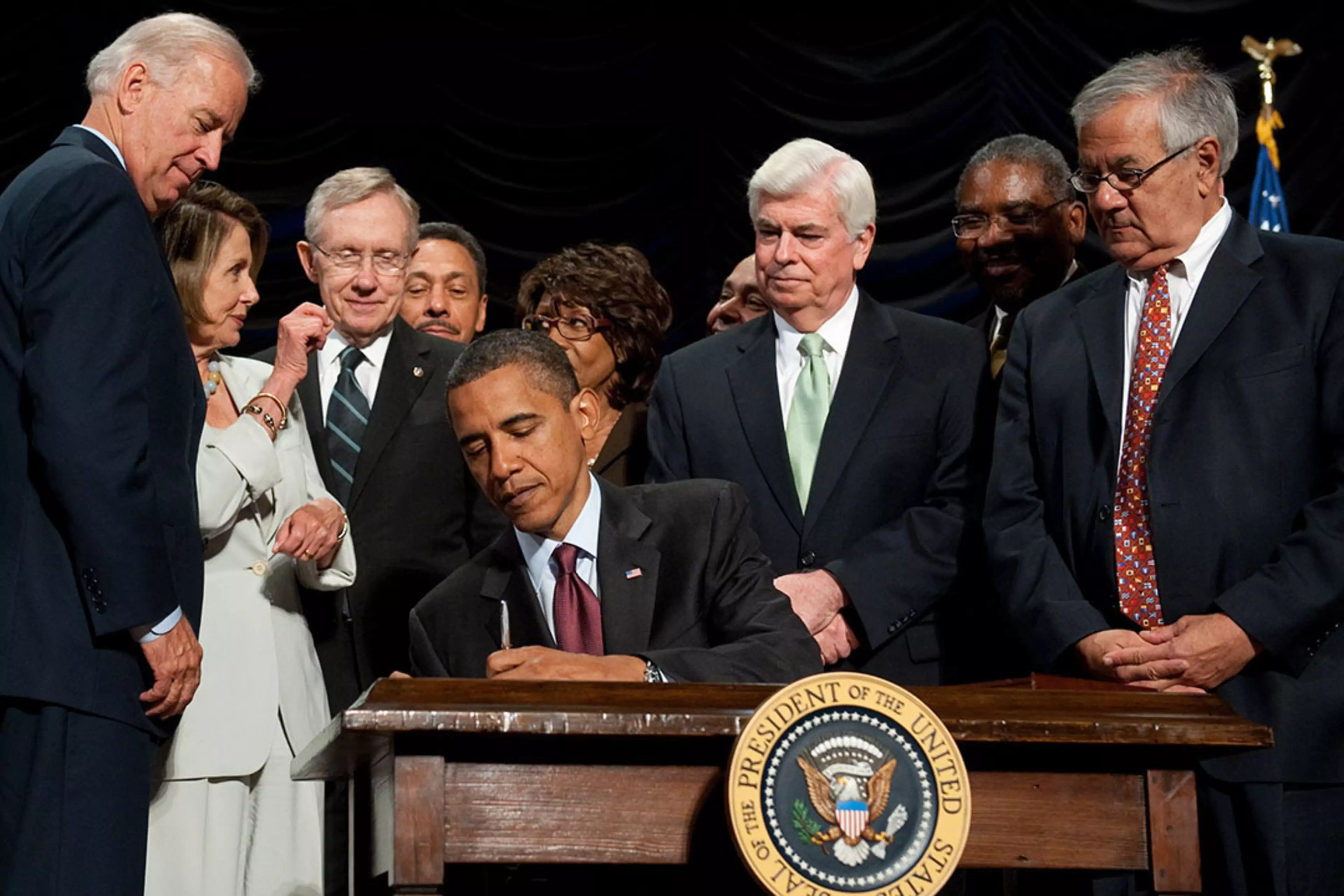Former U.S. President Barack Obama signs the Dodd-Frank Act in 2010.
