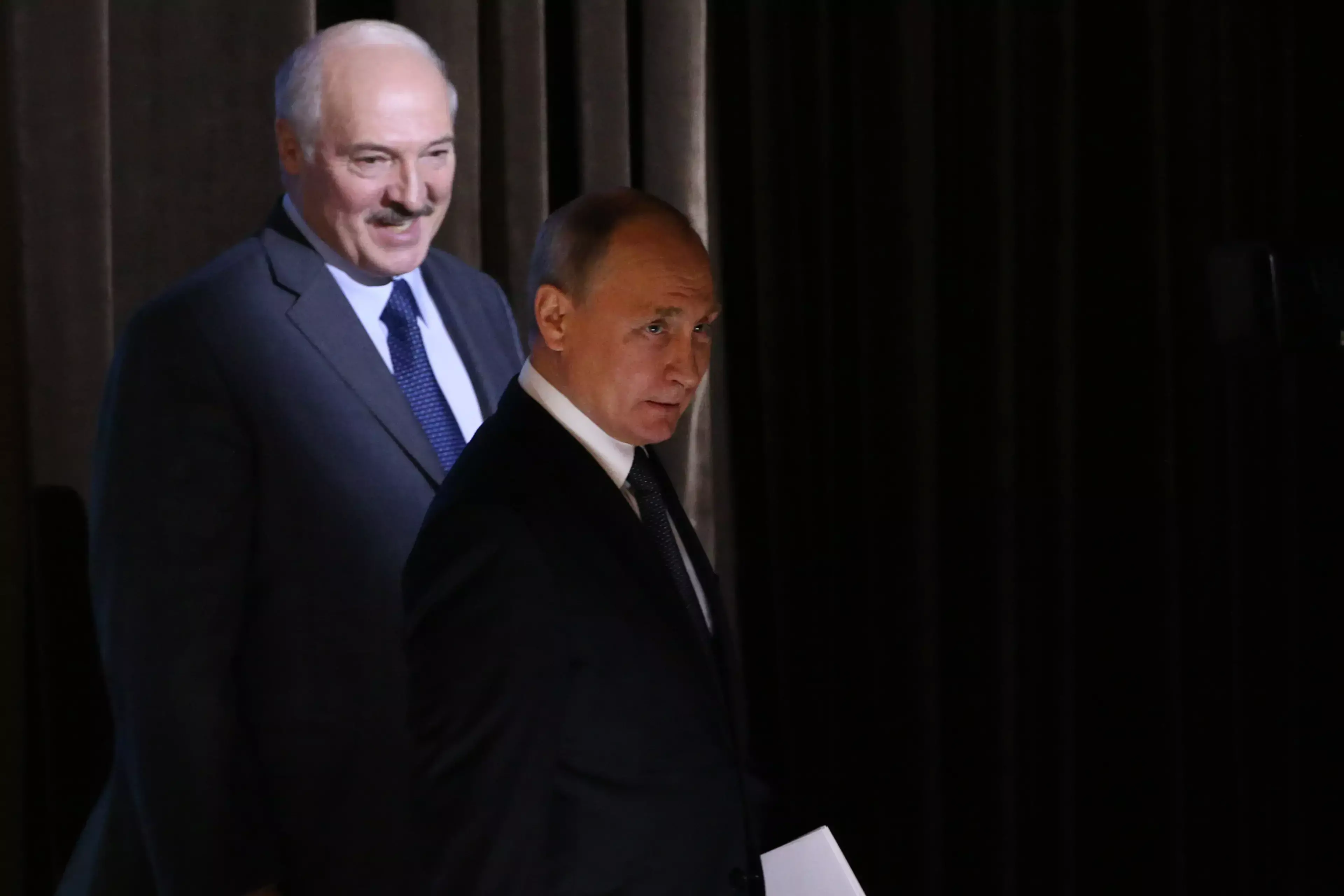 Presidents Alexandr Lukashenko and Vladimir Putin attend a regional forum in 2018.