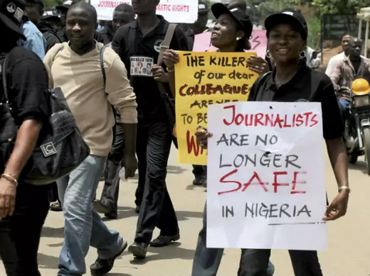 Journalists carry placards along a street during a protest to mark World Press Freedom day in Nigeria's commercial capital Lagos, May 3, 2010. 