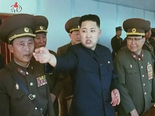 Kim Jong-un speaks while surrounded by soldiers in this undated still image by North Korean state TV KRT on January 8, 2012. (Courtesy Reuters)