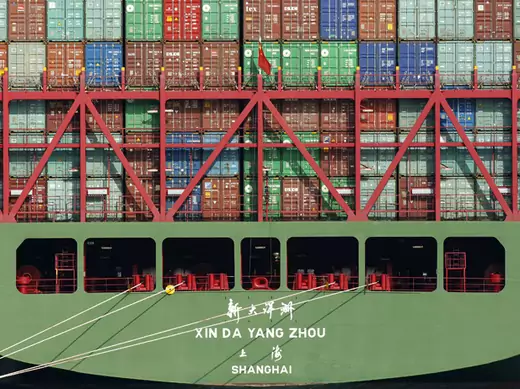 China Shipping containers sit on a ship in the Port of Los Angeles after being imported to the U.S.