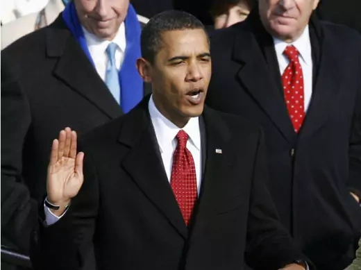 Barack Obama takes the oath given by U.S. supreme chief justice John Roberts, Jr. during the inauguration ceremony in Washington on January 20, 2009. (Jim Bourg/Courtesy Reuters).