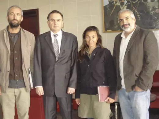 Anthony Shadid (right) with other New York Times journalists and Turkey's Ambassador to Libya on March 21, 2011. (Handout/courtesy Reuters)