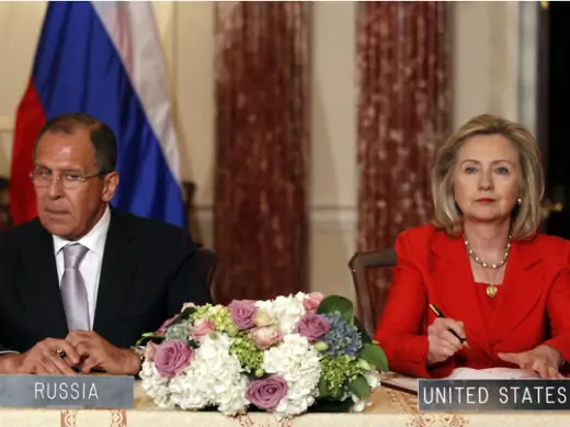 U.S. secretary of state Hillary Clinton and Russian foreign minister Sergey Lavrov look up during a signing ceremony at the State Department in Washington on July 13, 2011 (Kevin Lamarque/Courtesy Reuters).