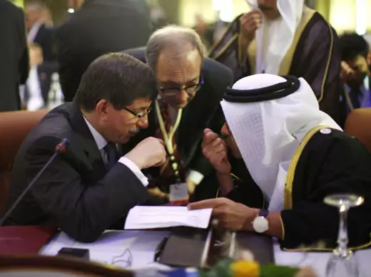 Turkey's foreign minister Ahmet Davutoglu confers with United Arab Emirates' foreign minister Sheikh Abdullah bin Zayed al-Nahyan during the “Friends of Syria” conference in Tunis on February 24, 2012 (Jason Reed/Courtesy Reuters).  