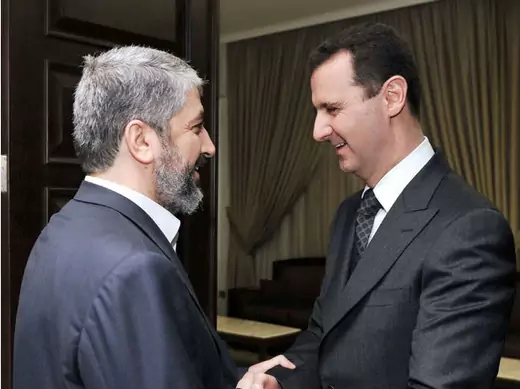 Syria's president Bashar al-Assad shakes hands and welcomes Hamas leader Khaled Meshal before a meeting in Damascus on January 24, 2009—three years before Meshal would break with the former (Courtesy Reuters).