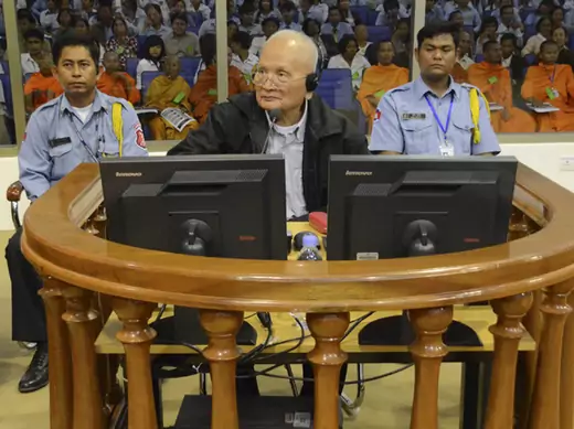 Former Khmer Rouge leader "Brother Number Two" Nuon Chea (C) sits in the court room at the Extraordinary Chambers in the Courts of Cambodia (ECCC) on the outskirts of Phnom Penh, December 5, 2011. 
