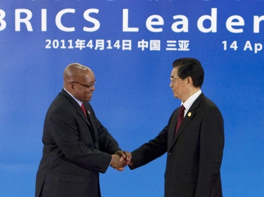 South Africa's President Zuma is greeted by China's President Hu during the BRICS Leaders Meeting in Sanya