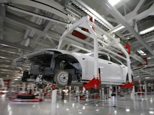 A Tesla Motors Model S is undergoing assembly at a Fremont, California factory—formerly co-owned by GM and Toyota—that Tesla purchased with the proceeds of a $465 million DoE loan. (Stephen Lam/Courtesy Reuters)