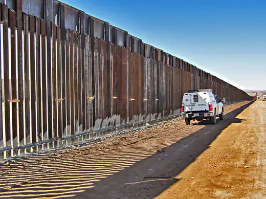 A border patrol vehicle observes six miles of border fencing in Douglas, Arizona, February 15, 2012. (Curt Prendergast / Courtesy Reuters)