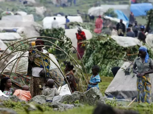 Refugees from the Democratic Republic of Congo construct makeshift shelters at a refugee camp at Bunagana near Kisoro town 521km (312 miles) southwest of Uganda capital Kampala, May 15, 2012.