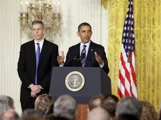 President Barack Obama discusses the first round of NCLB waivers on February 9, 2012 with Secretary of Education Arne Duncan looking on (Yuri Gripas/Courtesy Reuters).