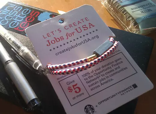 Starbucks "Create Jobs for USA" wristband. (seanmcmenemy/flickr)
