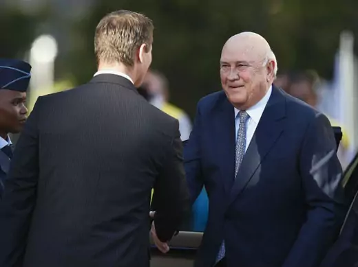 South Africa's former president F.W. De Klerk (R) arrives for the opening of Parliament on the 20th anniversary of Nelson Mandela's release from prison, in Cape Town February 11, 2010