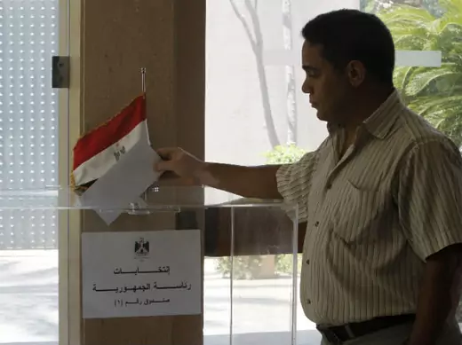 An Egyptian expatriate living in Lebanon casts his ballot at a polling station at the Egyptian embassy in Beirut on May 11, 2012, during an early voting ahead of Egypt's presidential election (Sharif Karim/Courtesy Reuters).