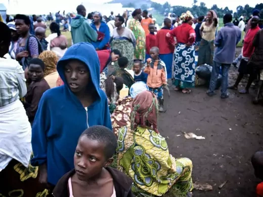 Newly arrived refugees from the Democratic Republic of Congo gather at the Nakamira transit camp from the La Corniche border crossing near Gisenyi, northwest Rwanda, May 2, 2012, after fleeing the Masisi region in Congo's North Kivu province after fighting broke out between Congolese troops and fighters loyal to a renegade general.