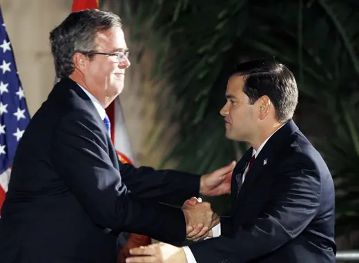Former Florida governor Jeb Bush shakes hands with then-U.S. Republican Senate candidate Marco Rubio in Coral Gables, Florida in November 2010 (Hans Deryk/Courtesy Reuters).