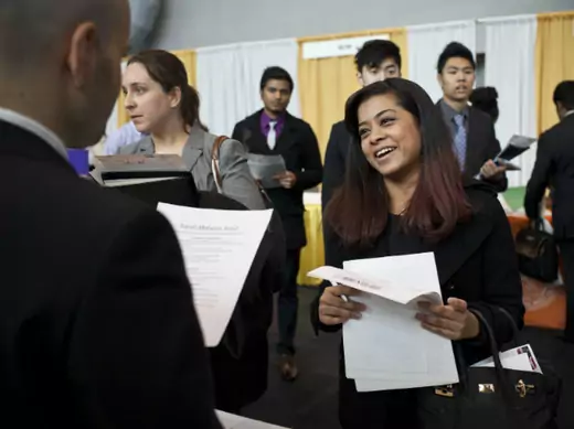 College seniors meet with representatives from companies at the 2012 Big Apple job and internship fair in New York (Andrew Burton/Courtesy Reuters).