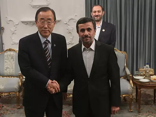 United Nations Secretary-General Ban Ki-moon poses for a photo with Iran's President Ahmadinejad upon his arrival for 16th summit of Non-Aligned Movement in Tehran