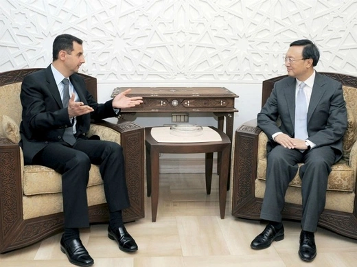 Syria's President Bashar al-Assad (L) meets China's Foreign Minister Yang Jiechi in Damascus on April 26, 2009.