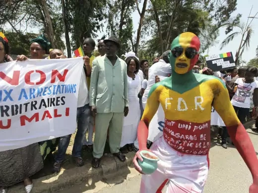 Citizens of Mali protest during the Economic Community of West African States (ECOWAS) meeting, where the Mali crisis and Guinea-Bissau coup are discussed, in Abidjan April 26, 2012.
