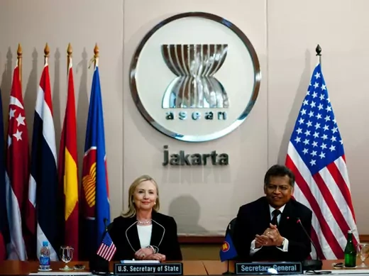 U.S. Secretary of State Clinton speaks with ASEAN Secretary-General Pitsuwan during a meeting at the ASEAN Secretariat in Jakarta