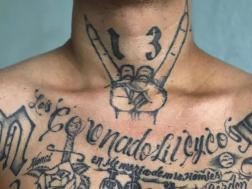 "El Recio", a former leader of the Mara Salvatrucha or M -13 gang, poses during a photo session at Comayagua jail in Honduras