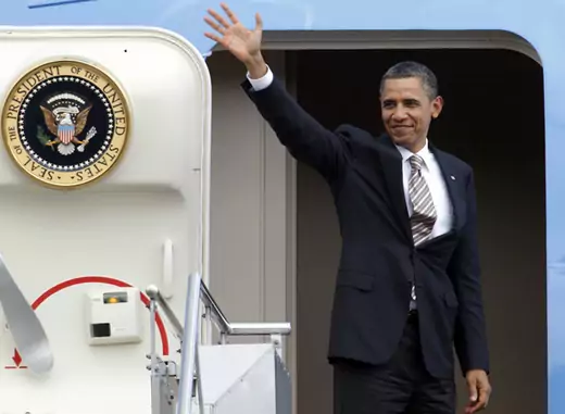 President Barack Obama waves at the door of Air Force One; The U.S. president will travel to Southeast Asia November 16-21, 2012.