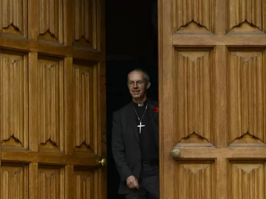  Newly appointed Archbishop of Canterbury Welby, leaves after a news conference at Lambeth Palace in London 09/11/2012.