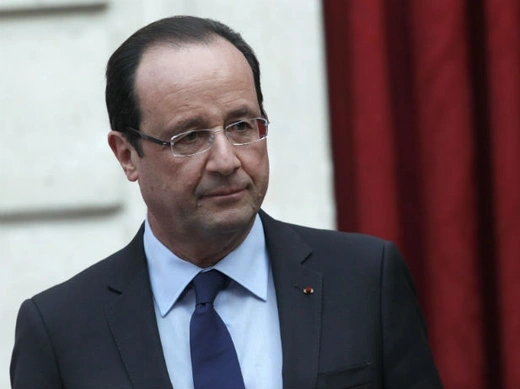 France's President Hollande gives a speech where he declared "mission accomplished" during a ceremony to honour French troops at the Elysee Palace in Paris 21/12/2012.