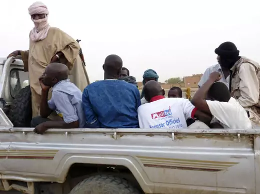  Militiaman from the Ansar Dine Islamic detain men in northeastern Mali 18/06/2012. 