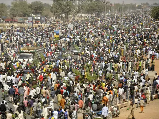  People protest on a street in Kano before the suspension of a nationwide strike by labour unions 16/01/2012.