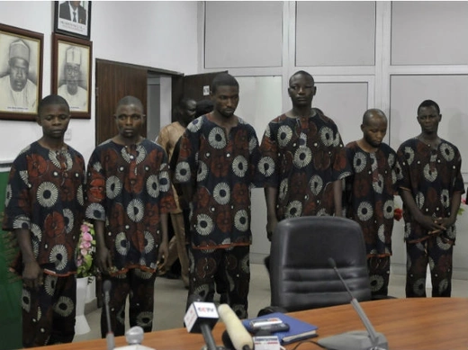 Members of a criminal gang that kidnapped a United Arab Emirate national Mohammed Khamis al Ali, are paraded by the state security service (SSS) in Nigeria's capital Abuja March 29, 2012.