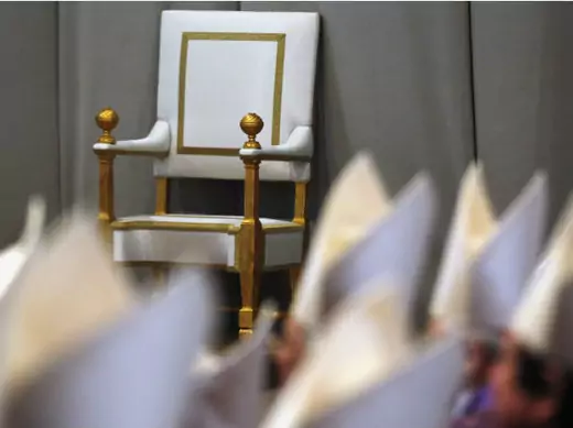 An empty papal throne is pictured before the Ash Wednesday mass at the St. Peter's Basilica in the Vatican February 13, 2013.