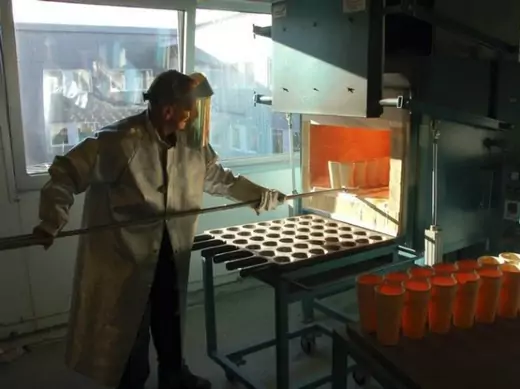 A lab manager at Activation laboratories prepares samples of mines to check ore grades of minerals in Nuuk, Greenland, on October 15, 2012. 