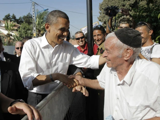 U.S. democratic presidential candidate Barack Obama shakes hands with an elderly Israeli man during his visit to Sderot on July 23, 2008 (Hong/Courtesy Reuters).