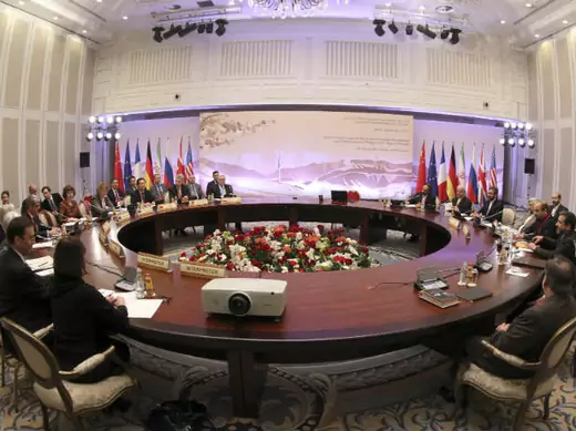Participants sit at a table during talks on Iran's nuclear program in Almaty on February 26, 2013 (Filippov/Courtesy Reuters).. 