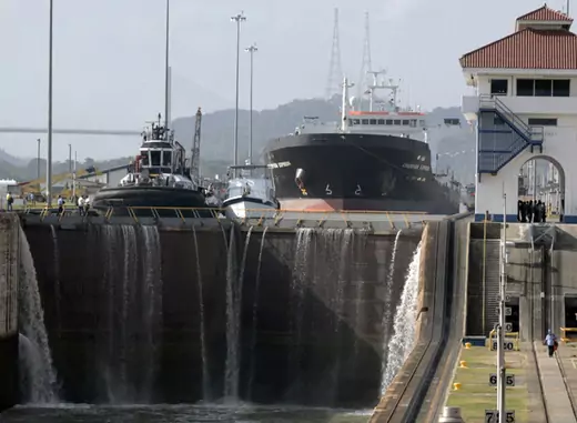 A Cargo ship, Champion Express waits to pass through the Miraflores Locks in the Panama Canal, in Panama City