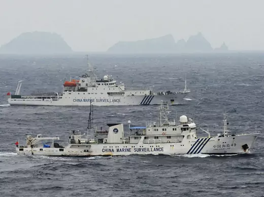 Chinese marine surveillance ships patrol the Senkaku/Diaoyu Islands in the East China Sea (Kyodo/Courtesy Reuters).
