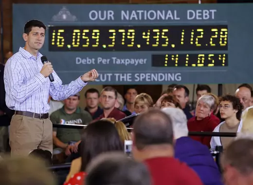 U.S. Congressman Paul Ryan (R-WI) speaks in front of the "national debt clock" in New Hampshire, September 2012 (Brian Snyder/Courtesy Reuters.)