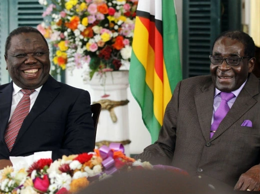 Zimbabwean President Robert Mugabe (R) and Prime Minister Morgan Tsvangirai address a media conference at State House in the capital Harare January 17, 2013.