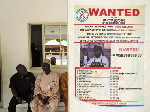 A poster advertising for the search of Boko Haram leader Abubakar Shekau is pasted on a wall in Baga village on the outskirts of Maiduguri, in the north-eastern state of Borno May 13, 2013.